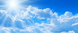Fototapeta  - Summer weather / cloudscape landscape background banner - Blue sky with clouds and sun sunshine sunbeams sun rays