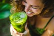 © Werckmeister - Health, drink and detox with woman and smoothie for diet, breakfast and protein. Nutrition, food and weight loss with face of person and glass for green juice, vitamins and supplement