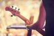 © Nicola K/peopleimages.com - Man, festival and guitar at stage for concert, performance and back view in Amsterdam. Closeup of male musician, standing and playing instrument at live event for crowd, audience and enjoyment