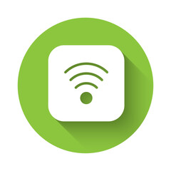 Poster - White Wi-Fi wireless internet network symbol icon isolated with long shadow background. Green circle button. Vector