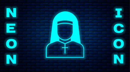 Wall Mural - Glowing neon Nun icon isolated on brick wall background. Sister of mercy. Vector