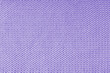 Close up background of knitted wool fabric made of viscose yarn, purple color wool knitwear texture. Sweater, pullover knitted jersey background. Fabric abstract backdrop, wallpaper