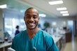 © vasyan_23 - Happy african american man medical assistant in clinic. Nurse in uniform doctor at hospital