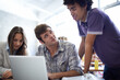 © M Moller/peopleimages.com - Students, laptop and university with group work or online assignment as project, research or studying. Man, woman and teamwork or internet proposal or academic knowledge, higher education or lecture