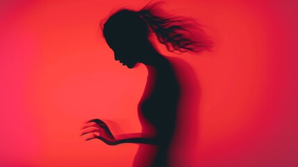 Wall Mural - Female blurred silhouette on a red background. Elegant outline of a woman in motion out of focus