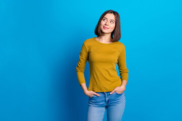 Poster - Photo of cheerful dreamy woman wear shirt smiling looking empty space isolated blue color background