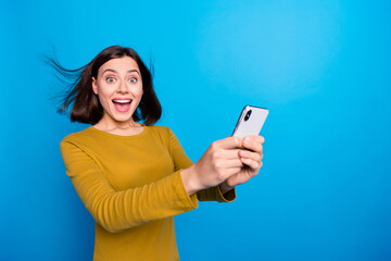 Wall Mural - photo of cheerful positive lady dressed shirt communicating apple iphone samsung device empty space 