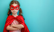 young girl superhero with red mask and cape posing confidently,  power concept , with copy space for text 