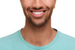 © New Africa - Smiling man with healthy clean teeth on white background, closeup
