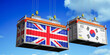 © PX Media - Shipping containers with flags of United Kingdom and South Korea - 3D illustration