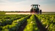 Agriculture tractor spraying fertilizer, Modern tractor spraying rural farmland
