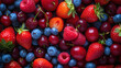 A vibrant mix of fresh berries background.