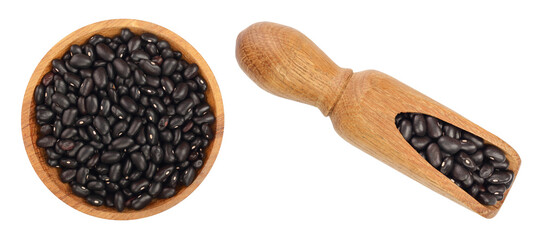 Wall Mural - black kidney bean in wooden bowl and scoop isolated on white background. Top view. Flat lay