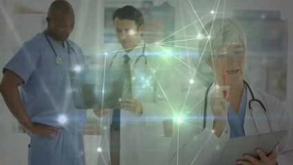 Poster - Animation of glowing communication network over diverse male and female doctors at work in hospital