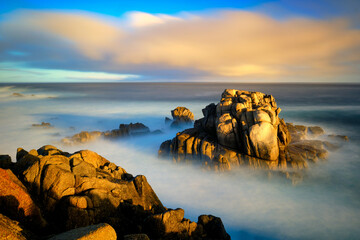 Wall Mural - Sunrise on the shore of Pacific Grove, California.