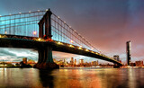 Fototapeta  - Panoramic view of Manhattan Bridge at night in New York. USA