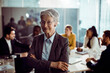 © Davor - Portrait of a confident senior businesswoman in conference room