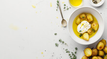 Bowl With Cooked Potatoes And Poached Egg On White Background, Top View