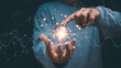 © krungchingpixs - Businessman holding and point lightbulb creative connection of futuristic technology internet network, New creativity and innovation are keys to business successful, Thinking and creative concept.