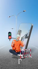 Asian girl in a scarf sitting with a suitcase while using a mobile phone on the street with a city view on the mobile phone screen