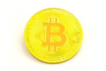 Symbol of the crypto currency. Bitcoin isolated on white background. Cryptocurrency - photo of golden bitcoin physical gold coin.