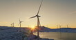 Drone view of wind turbines during sunset time in Lofoten islands Norway