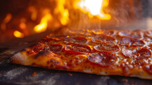 Glistening Pepperoni Slices Sizzle Atop A Perfectly Cooked Pizza Slice Surrounded By The Smoky Backdrop Of A Woodfired Oven.