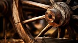 Fototapeta  - Detailed close-up of a wooden wagon wheel.