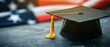 © Natalia - Graduation cap on american flag background. Generative AI.