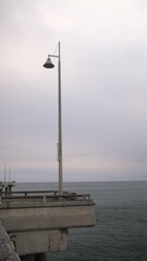 Wall Mural - pier in the fog vertical video 4k