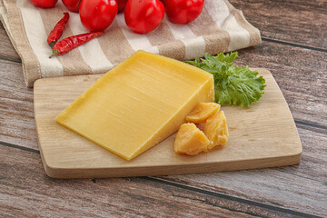 Wall Mural - Parmesan hard cheese with small pieces