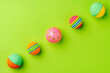 Leinwandbild Motiv Colorful pet toys balls on green background