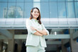 © Timeimage - Portrait of young Asian businesswoman outside the office
