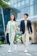 © Timeimage - Photo of two young Asian businesspeople