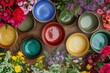 table with colorful ceramic dishes, surrounded by flowers