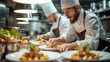 © visoot - A busy professional kitchen, two chefs working on multiple beautiful dishes. Fine dining. Generative AI.