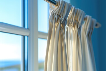 Poster - A detailed view of a curtain with a window visible in the background. This image can be used to depict privacy, interior design, or a cozy atmosphere