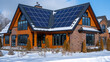 house with solar panels on the roof, winter and snow