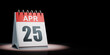 April 25 Calendar Spotlighted on Black Background
