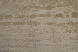 Fototapeta  - Texture of beige semi-smooth wall with stucco lace finish