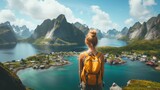 Fototapeta Most - A young woman stands with her back and admires the view of the azure sea and mountains. A person traveling on vacation in the most beautiful place in the world