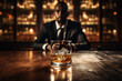 Image of bar, Whiskey and Man with blurred background, with empty copy space