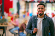© Monkey Business - Portrait Of Smiling Male University Student With Backpack Standing Inside College Building