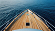 bow of modern sea yacht with teak wood deck, top view