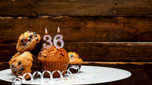 Pies With A Number 36  Of Candles Burning For The Anniversary. Copy Space Background Happy Birthday On Wooden Background. Card Or Postcard Festive Rustic Brown.