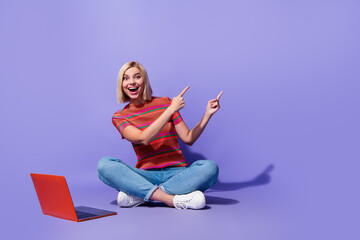 Poster - Full body photo of amazed young funny girl working web graphic designer showing investors her new idea isolated on violet color background