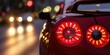 © Suwanlee - LED turn signal in the rear brake light of the car. Modern car lantern, close-up