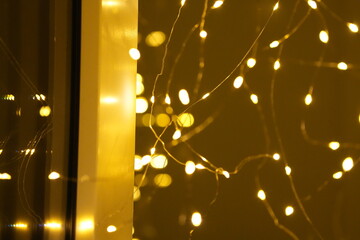 Wall Mural - close up of fairy christmas lights with bokeh background