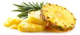 Fototapeta Lawenda - A pineapple, a fruit often used as an ingredient in various cuisines, is cut in half and sliced. It is displayed on a white background.