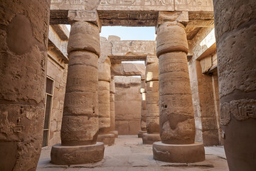 Famous ancient Karnak Temple complex, Luxor, Egypt. Ancient ruins of Karnak temple in Luxor. Egypt. Great Hypostyle Hall at the Temples of Karnak (ancient Thebes).